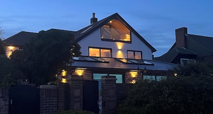Stunning Beach House beautiful sea-view large indoor swimming pool and a hot tub
