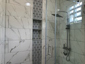 Shower, towels, soap, shampoo