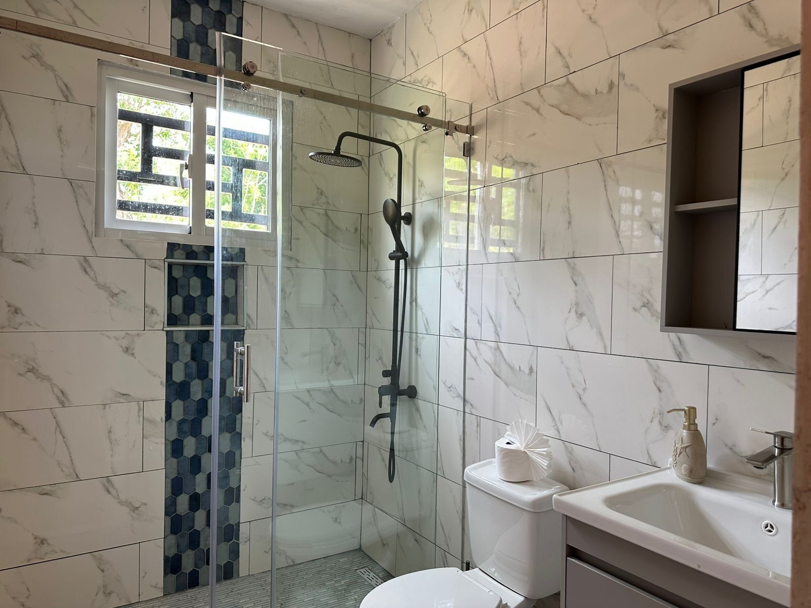Shower, towels, soap, shampoo