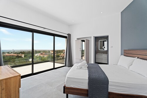 Luxury 7-bedroom villa with panoramic sea view & saltwater pool!