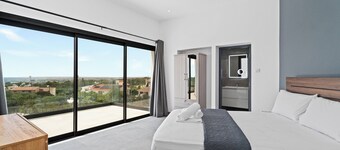 Luxury 7-bedroom villa with panoramic sea view & saltwater pool!