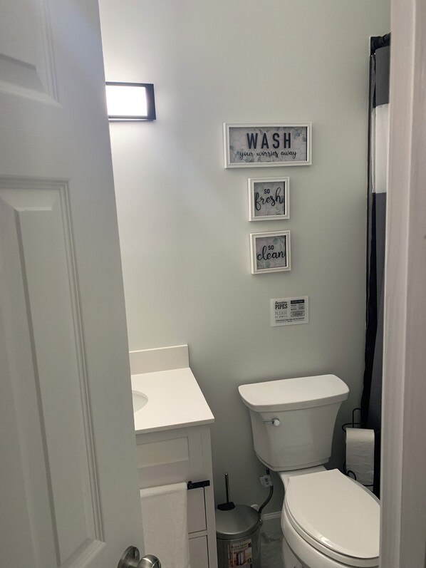 Shower, jetted tub, towels, soap