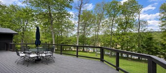 Hideaway on the lake; large mid-century stone ranch in a park-like setting