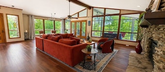 Hideaway on the lake; large mid-century stone ranch in a park-like setting