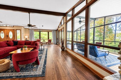 Hideaway on the lake; large mid-century stone ranch in a park-like setting