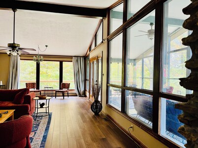 Hideaway on the lake; large mid-century stone ranch in a park-like setting