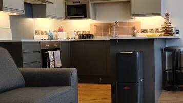 Superior Apartment, Sea View | Private kitchen | Espresso maker, coffee/tea maker, electric kettle, high chair