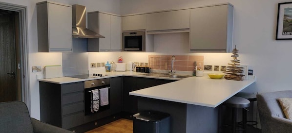 Apartemen Superior, pemandangan laut | Dapur pribadi | Mesin espresso, mesin pembuat kopi/teh, dan ketel listrik
