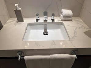 Jetted tub, hair dryer, towels, soap