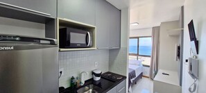 Apartment | Private kitchen | Fridge, microwave, stovetop, coffee/tea maker