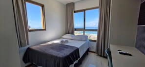 Apartamento | Wi-Fi de cortesia, roupa de cama