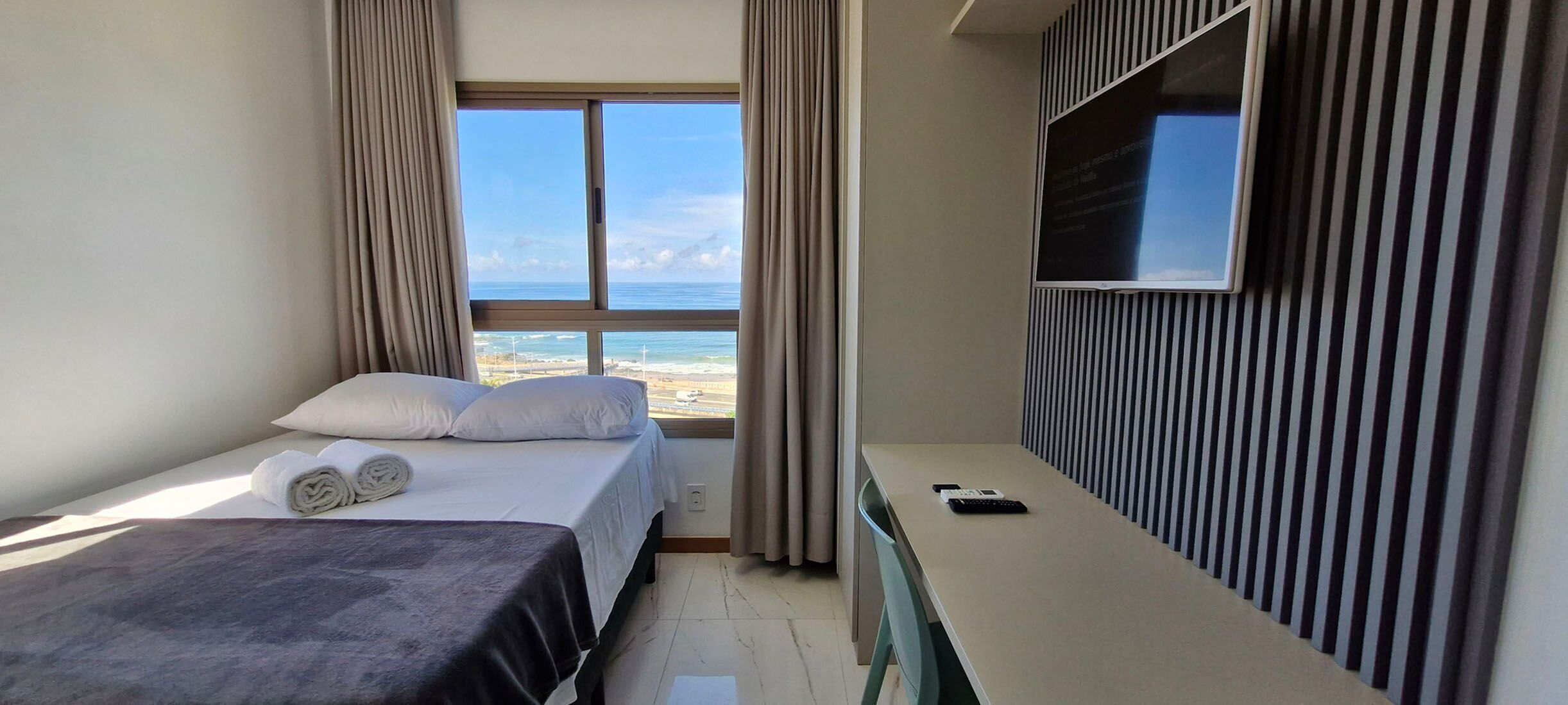 Apartamento | Wi-Fi de cortesia, roupa de cama