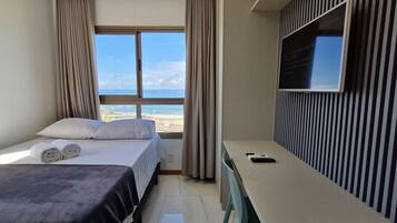 Apartamento | Wi-Fi de cortesia, roupa de cama