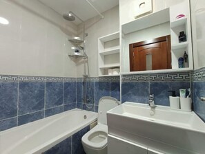 Hair dryer, towels, soap, shampoo