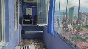 Deluxe Condo, Non Smoking, Balcony | Living area