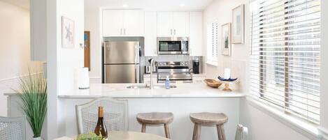 Condo, Multiple Beds, Balcony (158 Beach Club Villa) | Dining