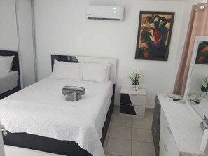 1 chambre, fer et planche à repasser, accès au Wi-Fi (inclus)