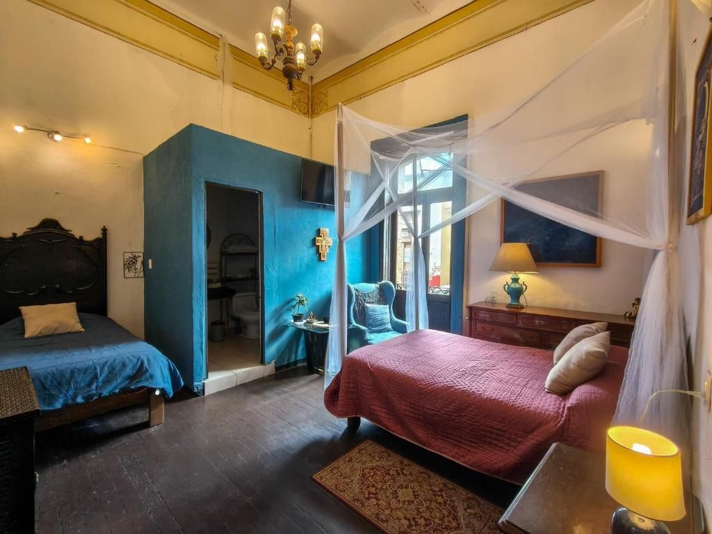 Habitación triple Confort, balcón, vista a la ciudad
