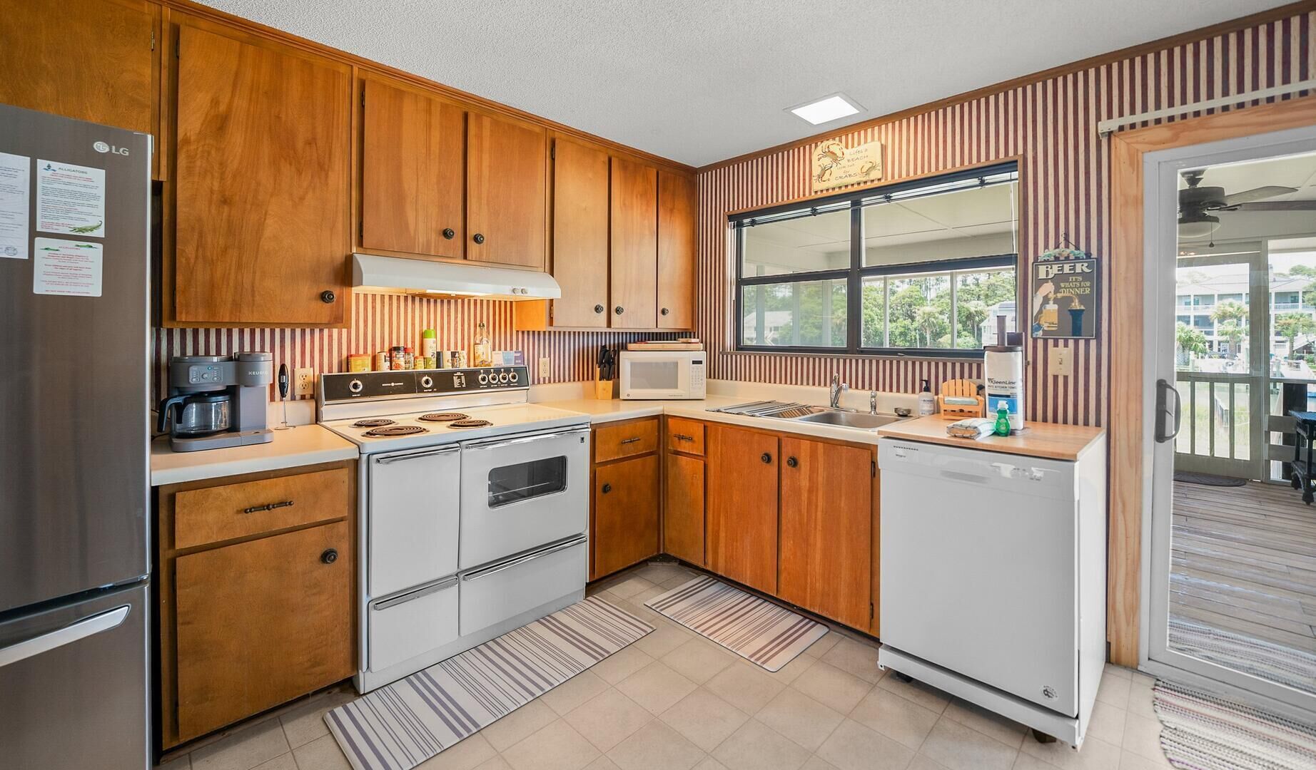 單棟房屋, 多張床, 露台 (419 Tarpon) | 私人廚房 | 雪櫃、微波爐、焗爐、爐具