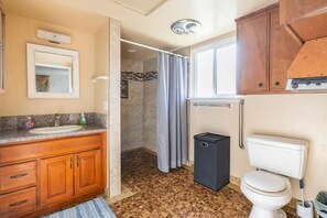 Shower, towels, soap, toilet paper