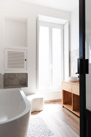 Shower, towels, soap, toilet paper