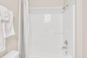 Hair dryer, towels, soap, shampoo