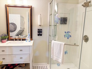 Shower, hair dryer, towels, soap