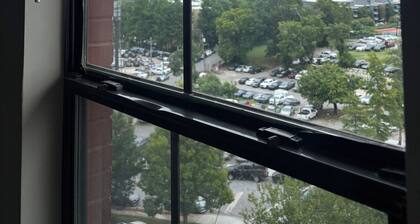 Walk to Mercedes-Benz Stadium from your chic city-view Atlanta getaway