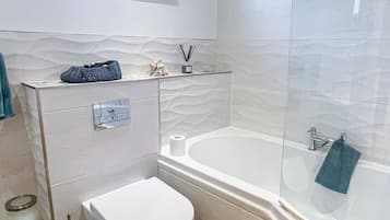 Hair dryer, towels, toilet paper
