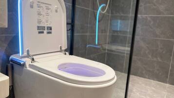Raised toilet seat