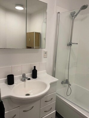 Hair dryer, towels, soap, toilet paper