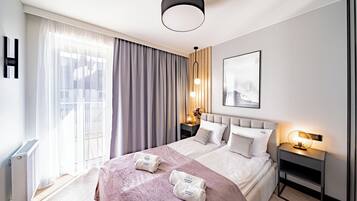 Deluxe appartement, airconditioning, langs het strand | Een laptopwerkplek, verduisterende gordijnen