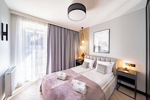 Deluxe Apartment, Air conditioning, Beachside | Laptop workspace, blackout drapes, iron/ironing board, free WiFi