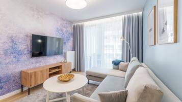 Deluxe appartement, airconditioning, langs het strand | Een laptopwerkplek, verduisterende gordijnen