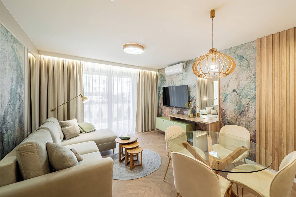 Deluxe Apartment, Air conditioning, Beachside | Laptop workspace, blackout curtains, iron/ironing board, free WiFi