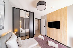 Appartement Deluxe, climatisation, au bord de la plage | Espace de travail pour ordinateurs portables, rideaux d’obscurcissement