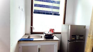Premium-Zimmer, 1 Doppelbett, Kühlschrank, Stadtblick | Eigene Küche