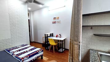 Premium Room, 1 Double Bed, Refrigerator, City View | Desk, laptop workspace, blackout curtains, iron/ironing board