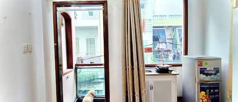 Premium Room, 1 Double Bed, Refrigerator, City View | Desk, laptop workspace, blackout drapes, iron/ironing board