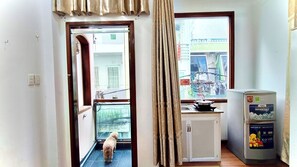 Premium Room, 1 Double Bed, Refrigerator, City View | Desk, laptop workspace, blackout curtains, iron/ironing board