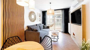 Deluxe Apartment, Private Bathroom, Beachside | Laptop workspace, iron/ironing board, free WiFi