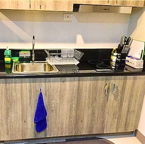 Suite Deluxe, vista al mar | Cocina privada