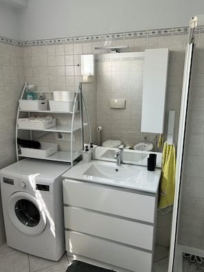 Hair dryer, towels, soap, toilet paper
