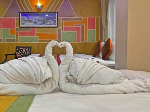 Deluxe Quadruple Room, City View | Desk, laptop workspace, soundproofing, free WiFi - Unique Inn (Kathmandu)
