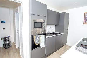 Familienapartment, Balkon, Gartenblick | Eigene Küche | Hochstuhl