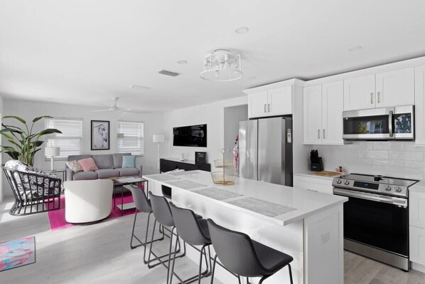 Fridge, microwave, oven, stovetop - Stayin on Palermo - Luxury Pool Home Walk to Beach (Fort Myers Beach)