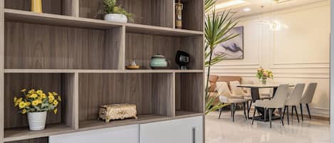 Deluxe Apartment, 4 Bedrooms, Non Smoking, City View | Living area | 24-inch TV with digital channels