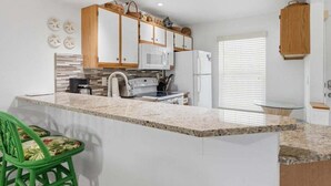 Private kitchen - 2BR/2BA Marco Island condo with pool, WiFi, kitchen, and parking. (Marco Island)