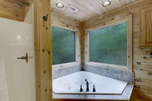 Shower, hair dryer, towels, shampoo