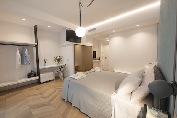 Deluxe Double Room, Balcony | Memory foam beds, desk, laptop workspace, blackout drapes